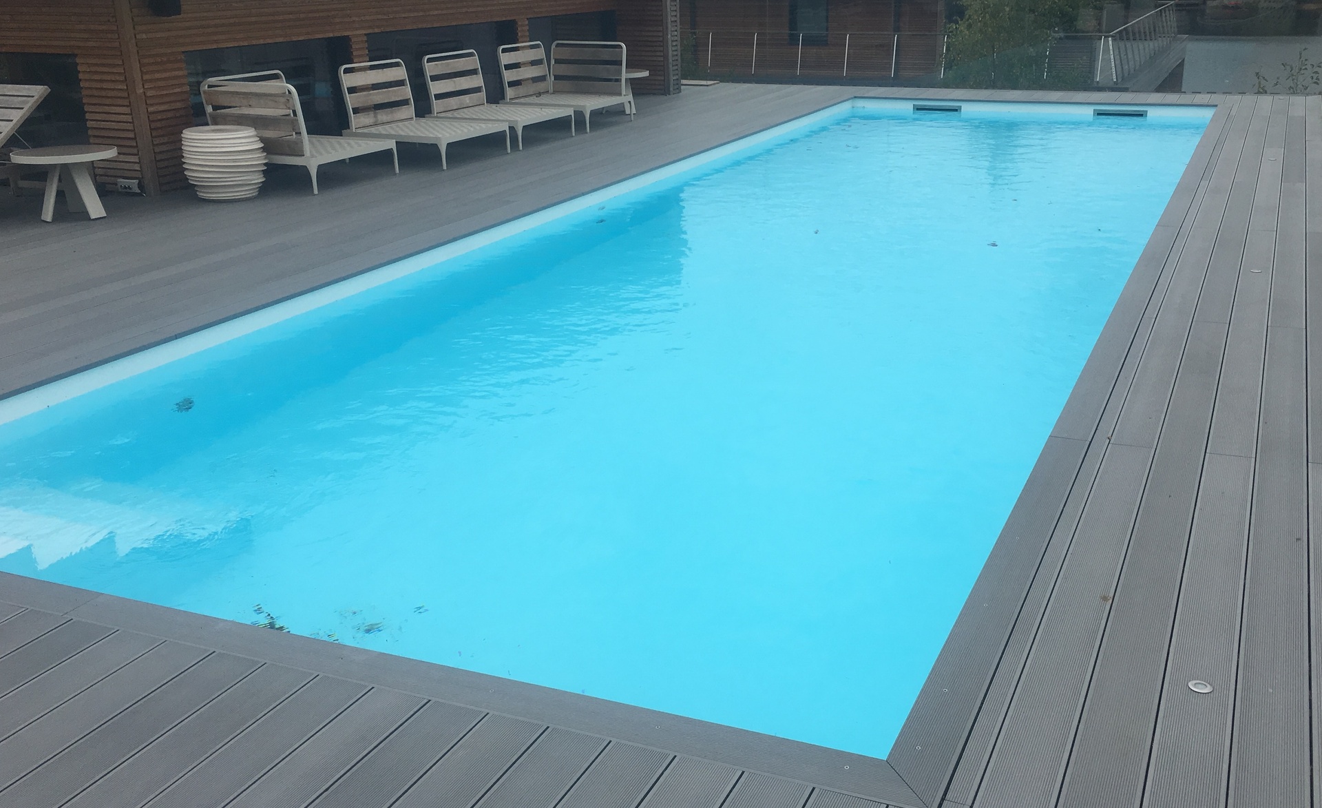 Swimming pool composite decking surround