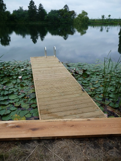 Jetty with swimming access ladder